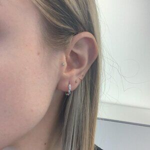 The Brigitte sterling silver CZ diamond hoop hoops earrings glam pave dainty